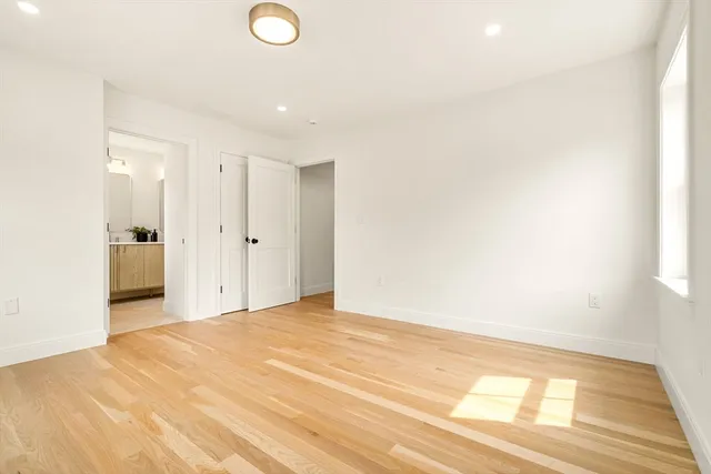 a view of an empty room and window