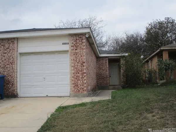 front view of a house with a dry yard