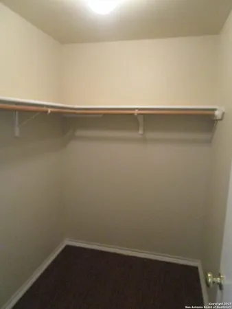 a view of small space with racks on the wall