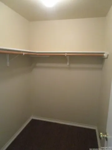 a view of small space with racks on the wall