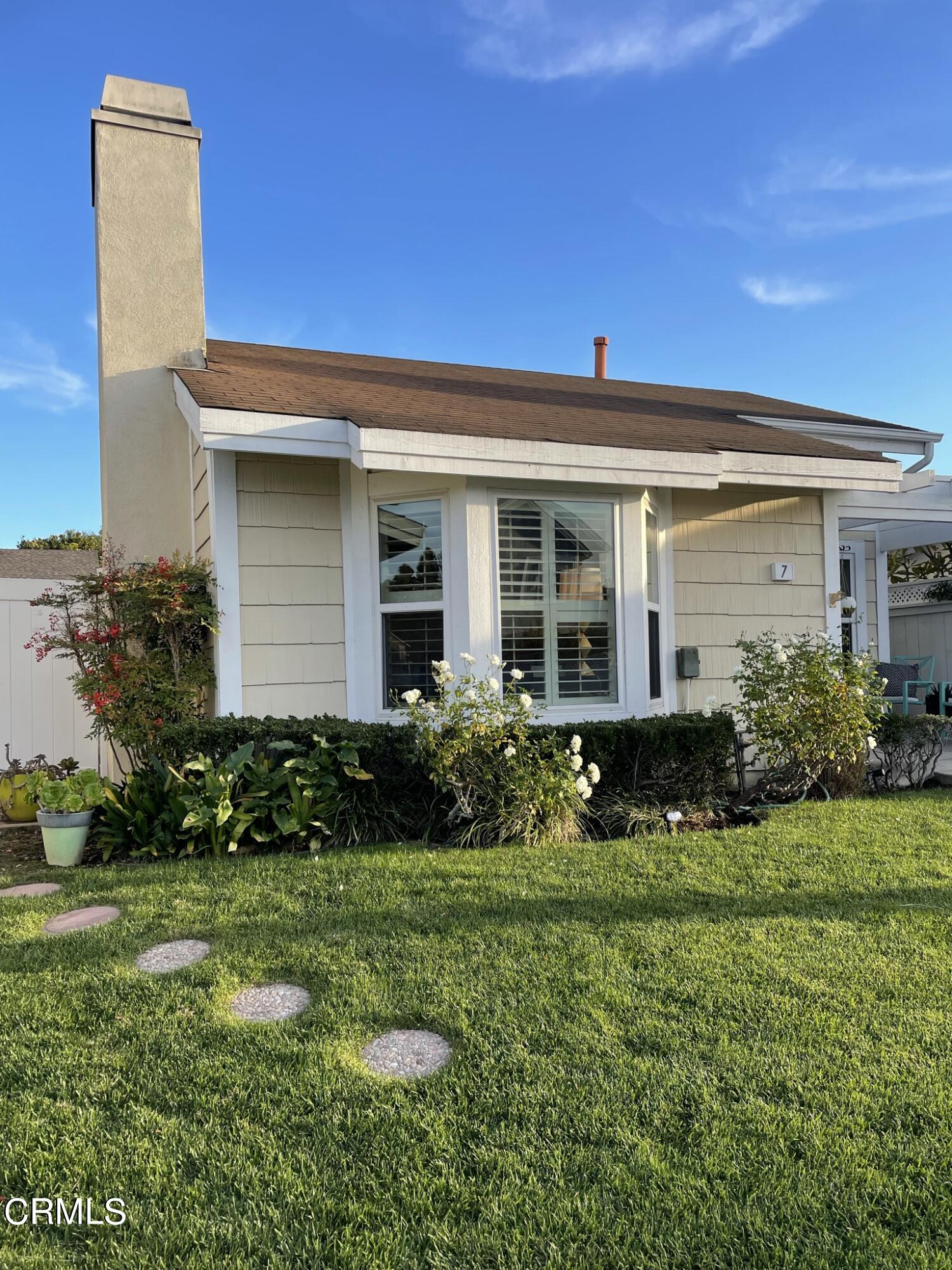 7 Racing Wind Irvine, CA 92614 - Photo 2 of 31 a front view of a house with a yard
