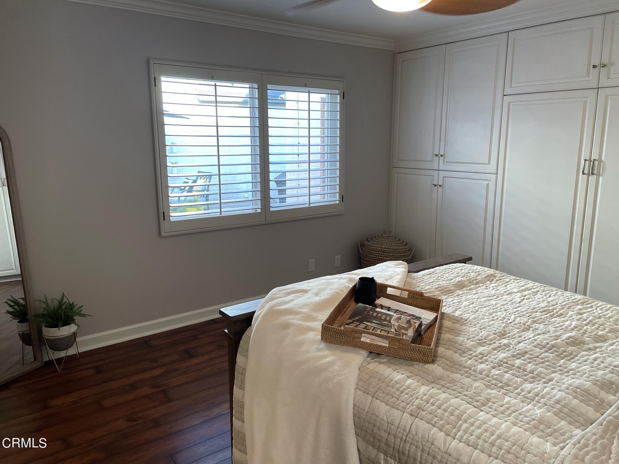 7 Racing Wind Irvine, CA 92614 - Photo 18 of 31 a bedroom with a bed and a window