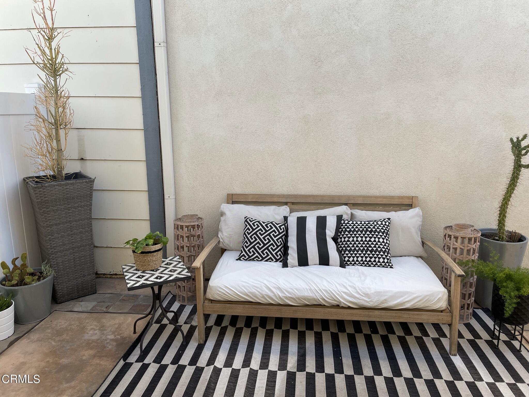 7 Racing Wind Irvine, CA 92614 - Photo 31 of 31 a balcony with a couch