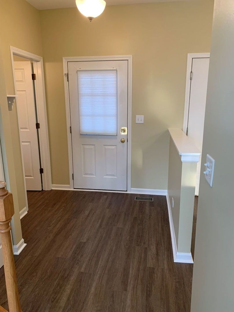 17783 Braewick Road Gurnee, IL 60031 - Photo 2 of 18 wooden floor in an empty room