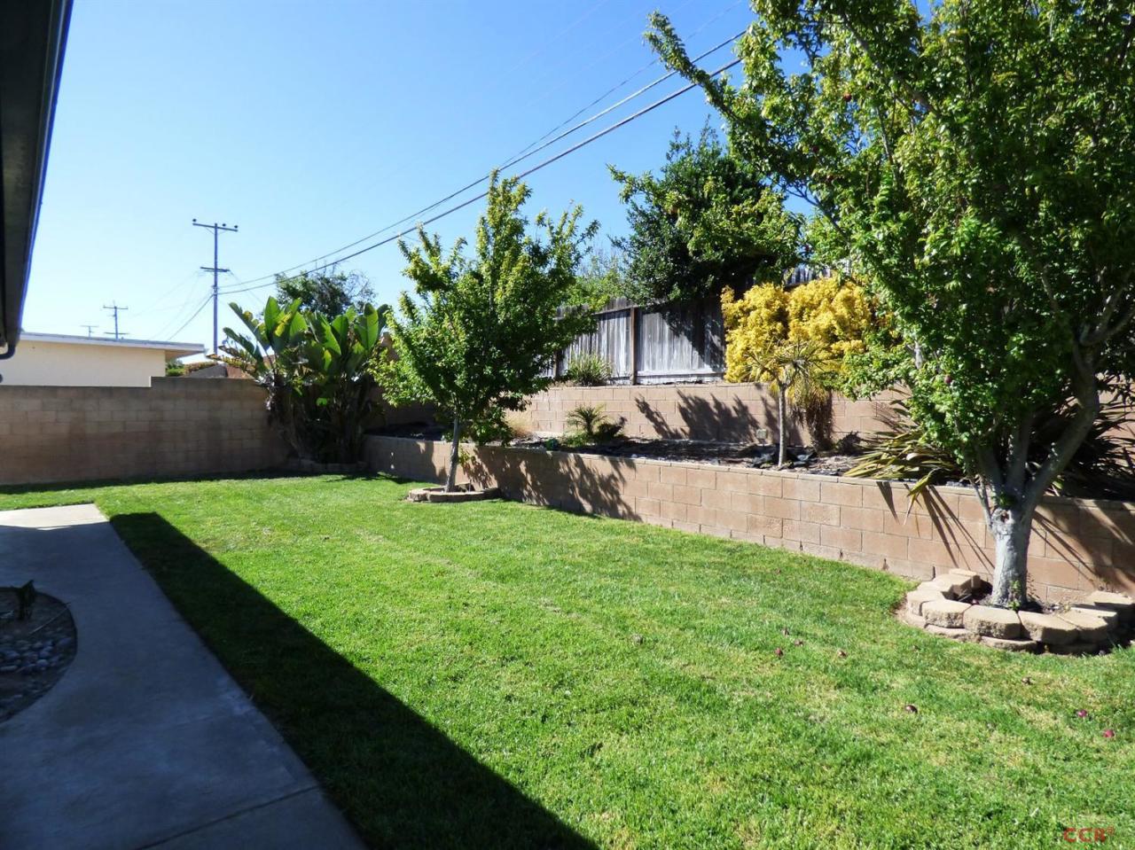 4259 Constellation Road Lompoc, CA 93436 - Photo 20 of 22 a view of a backyard with a garden