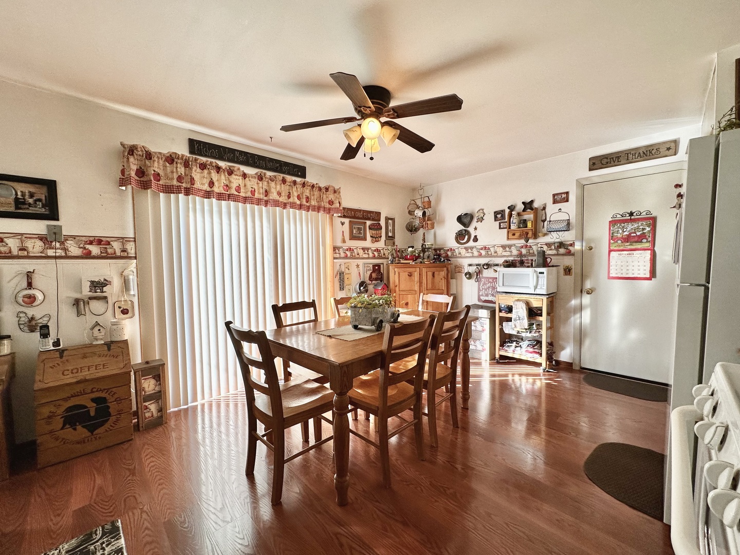 66 Sheffield Road Montgomery, IL 60538 - Photo 15 of 23 a view of a a dining room with furniture window and wooden floor