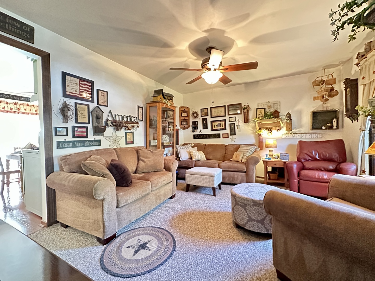 66 Sheffield Road Montgomery, IL 60538 - Photo 9 of 23 a living room with furniture and a large window