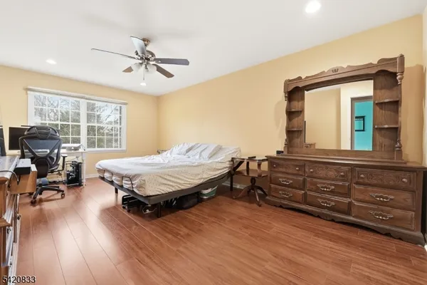 a view of balcony with wooden floor and fence