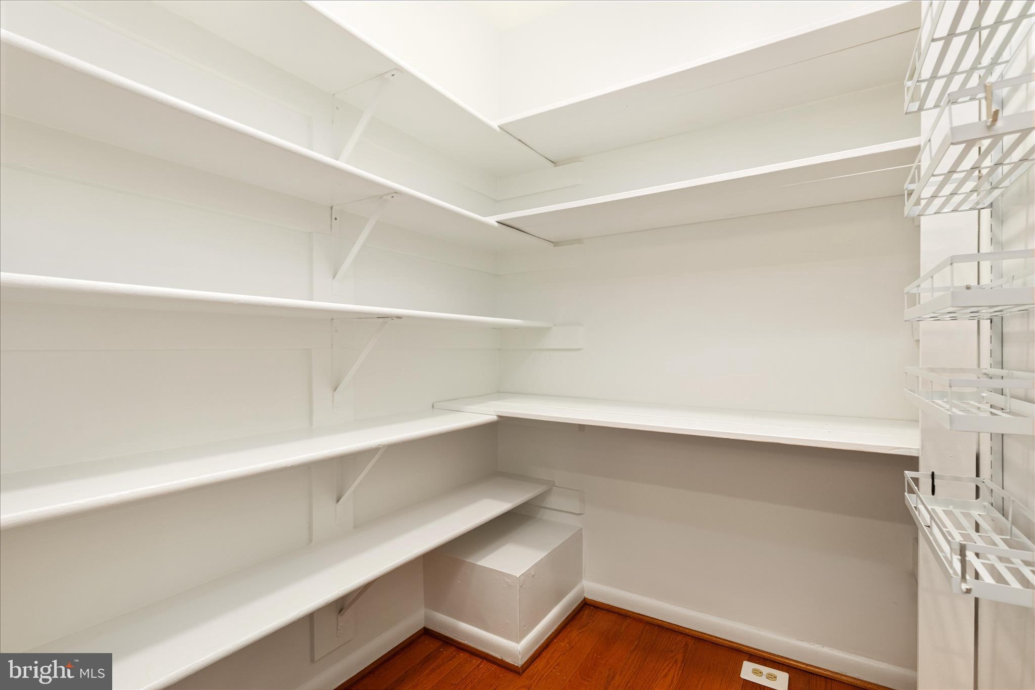 11608 Newbridge Court Reston, VA 20191 - Photo 16 of 47 a storage room with empty racks