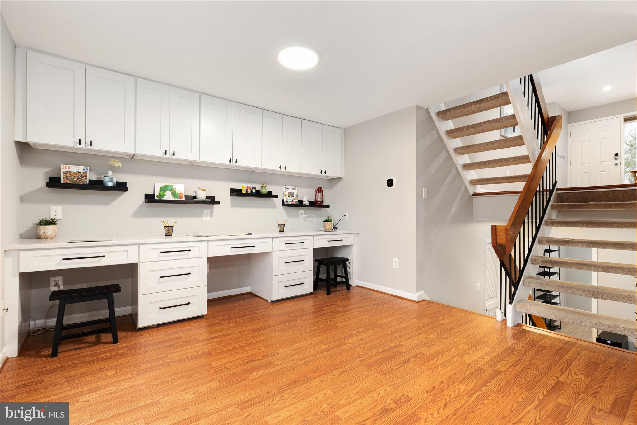 11608 Newbridge Court Reston, VA 20191 - Photo 17 of 47 a kitchen with white cabinets and appliances