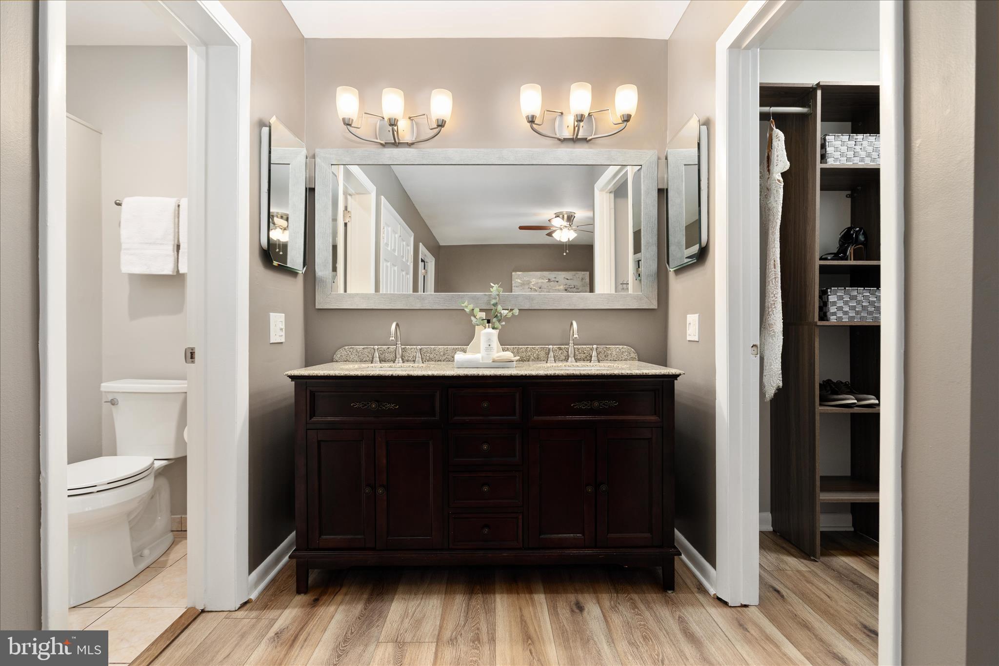 11608 Newbridge Court Reston, VA 20191 - Photo 23 of 47 a bathroom with a sink and a mirror