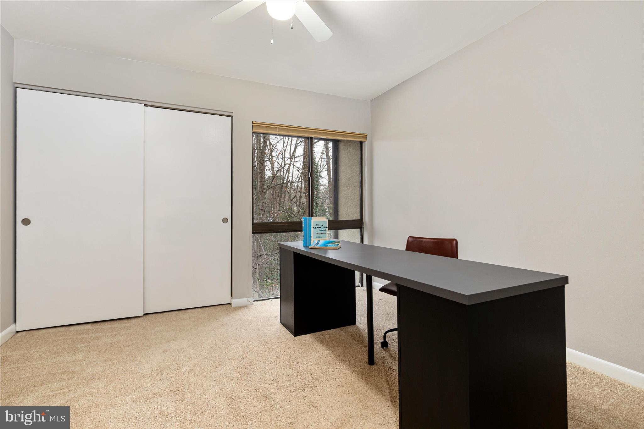 11608 Newbridge Court Reston, VA 20191 - Photo 26 of 47 a room with a table and chairs