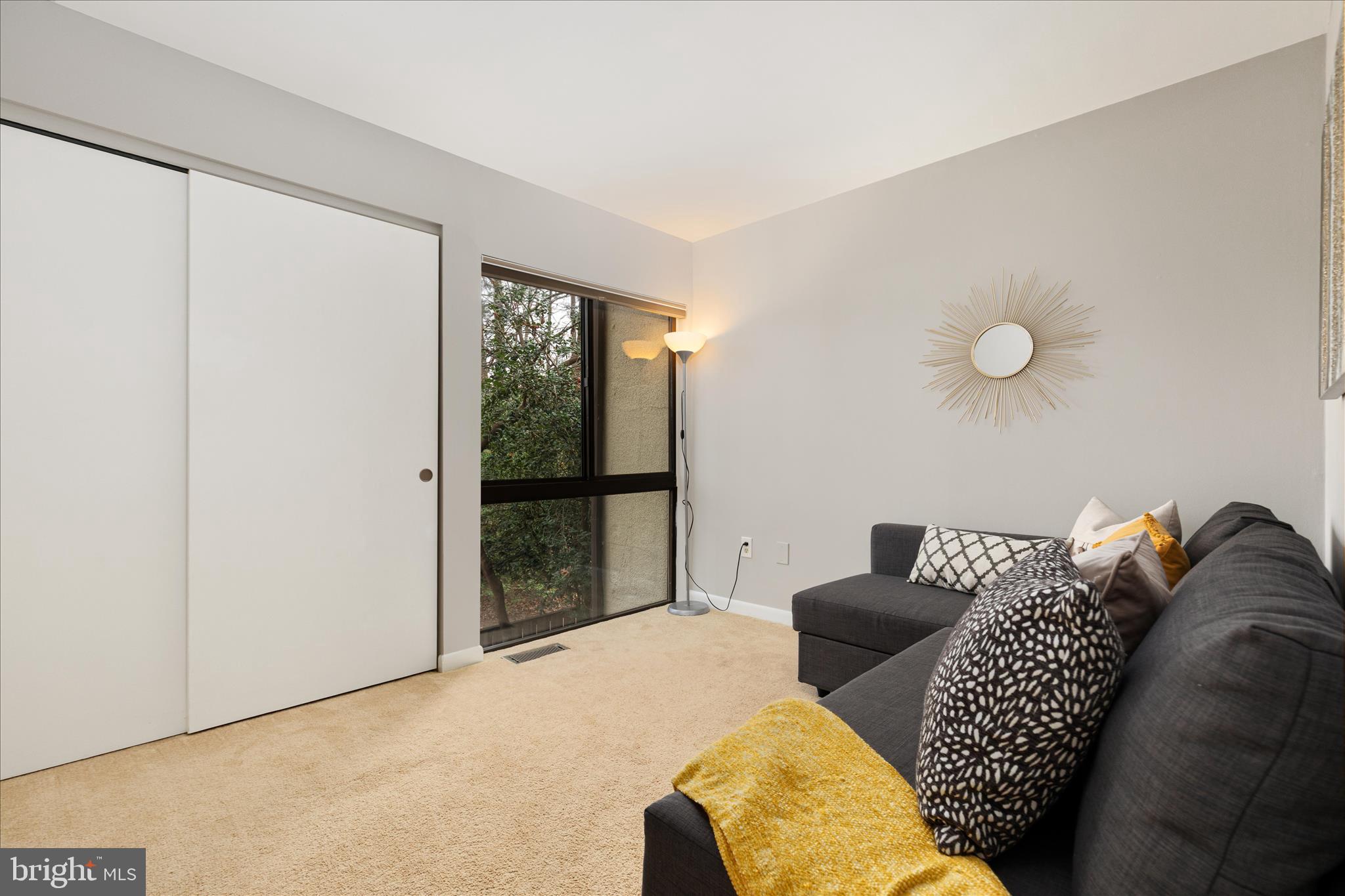 11608 Newbridge Court Reston, VA 20191 - Photo 28 of 47 a bedroom with a bed and window