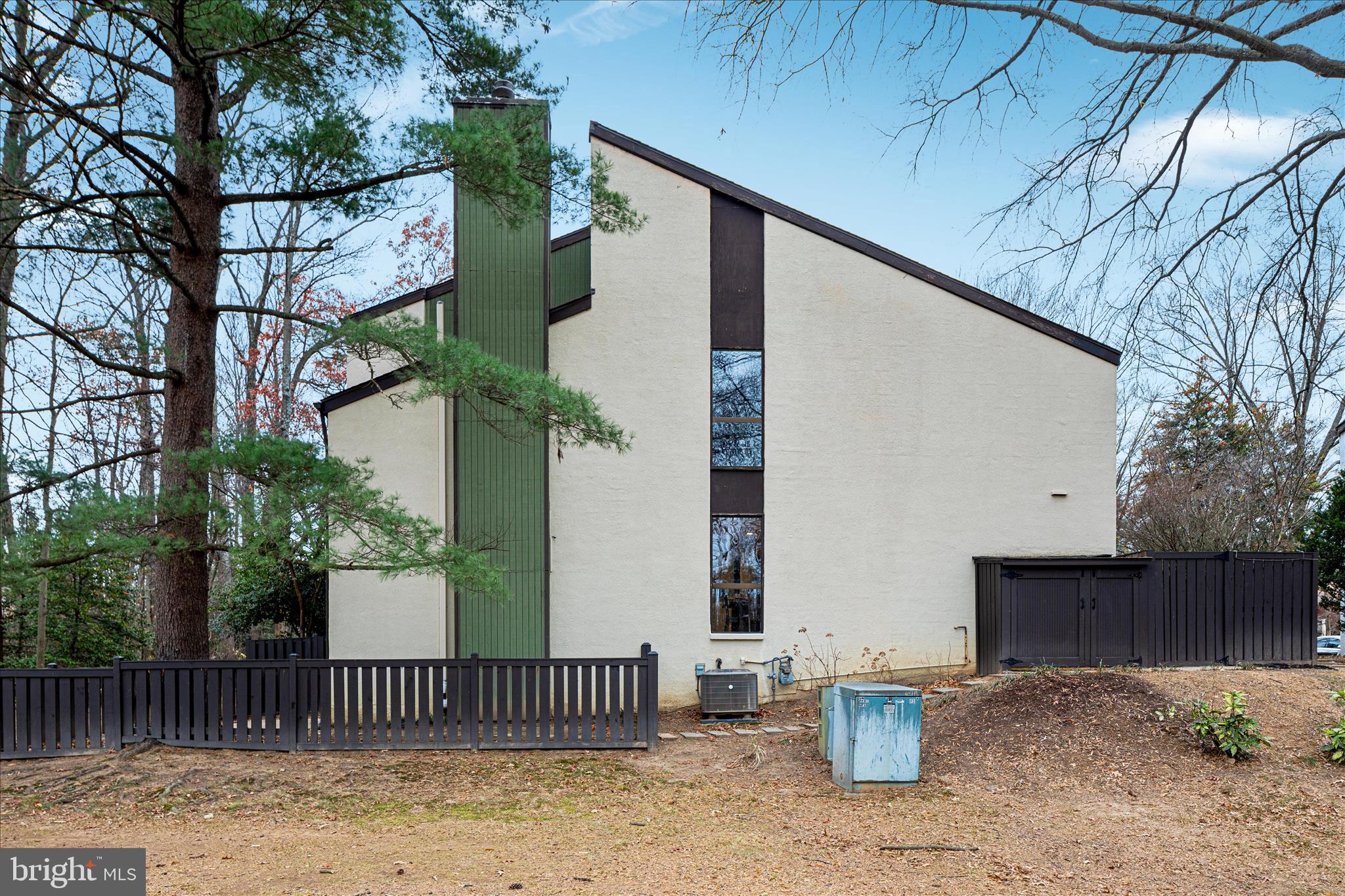 11608 Newbridge Court Reston, VA 20191 - Photo 45 of 47 a front view of a house with plants