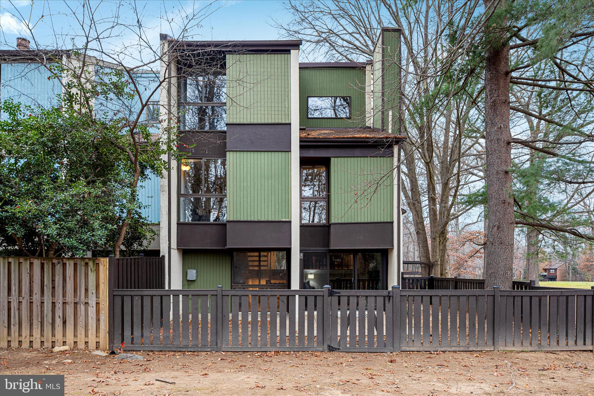 11608 Newbridge Court Reston, VA 20191 - Photo 47 of 47 a front view of a house with a garden