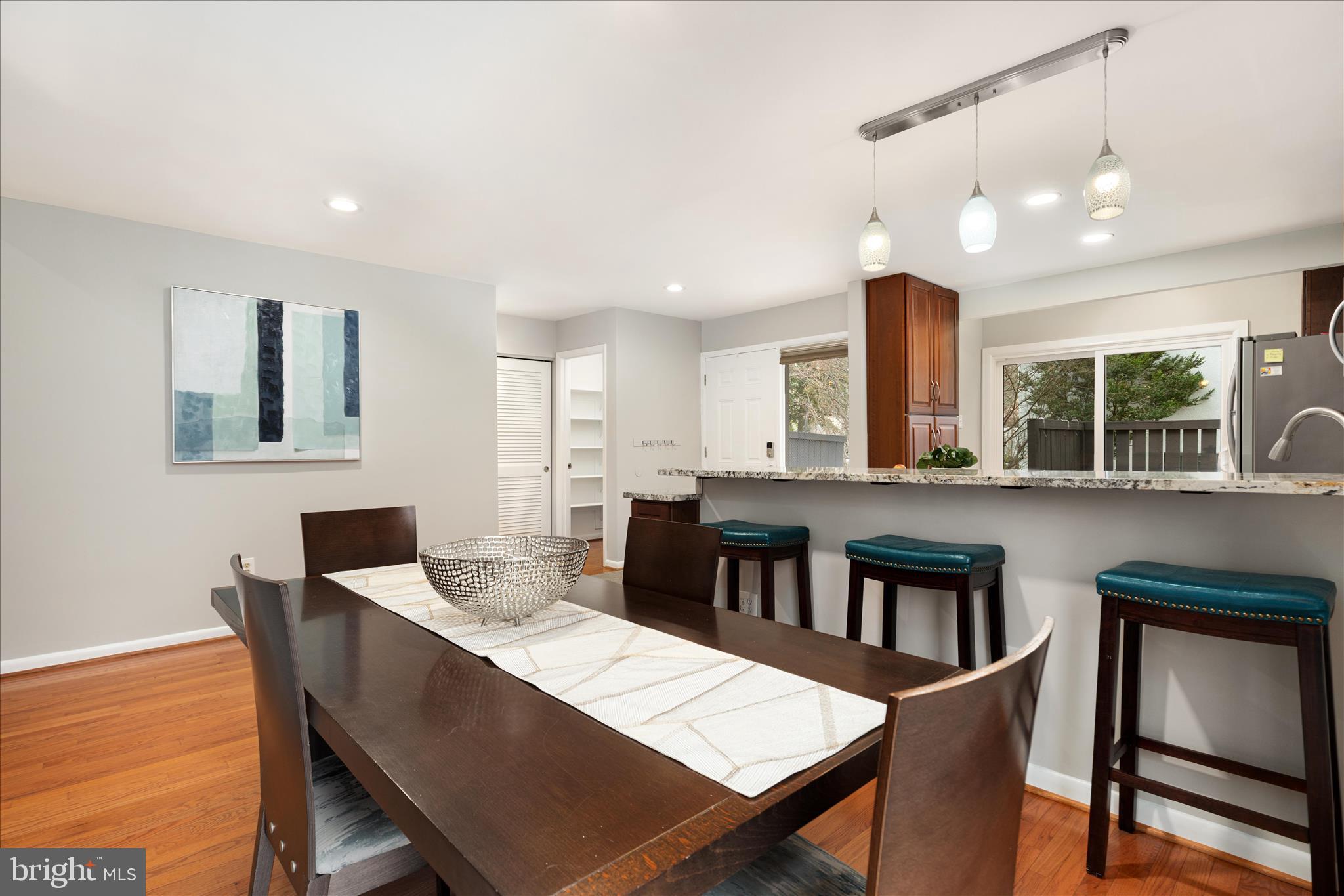 11608 Newbridge Court Reston, VA 20191 - Photo 5 of 47 a dining room with furniture and window