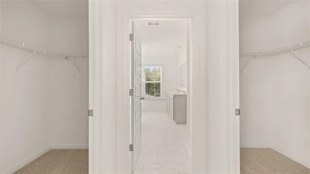 a white bath tub sitting in a bathroom