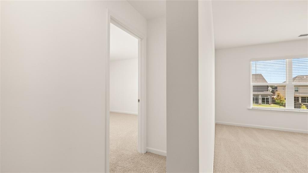 71 Weymouth Drive Locust Grove, GA 30248 - Photo 42 of 56 a view of a window in a room