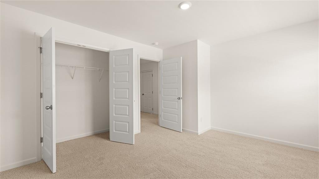 71 Weymouth Drive Locust Grove, GA 30248 - Photo 46 of 56 a view of an empty room