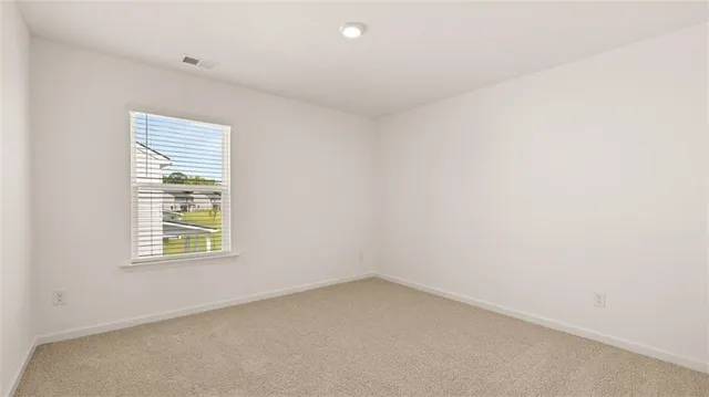 a front view of house with yard and seating area