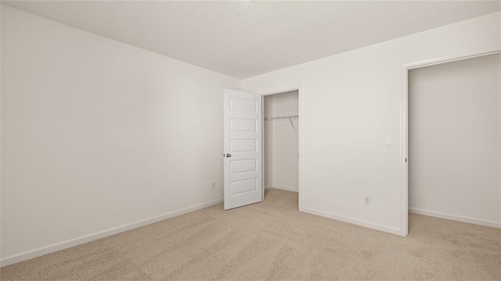 71 Weymouth Drive Locust Grove, GA 30248 - Photo 50 of 56 a view of an empty room