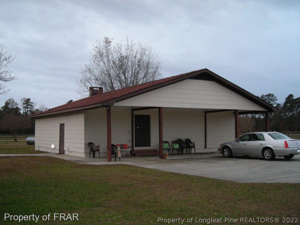 5310 Lovette Road Orrum, NC 28369 - Photo 2 of 31 a view of outdoor space with yard