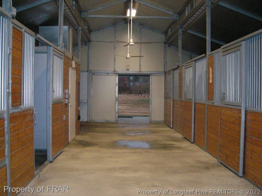 5310 Lovette Road Orrum, NC 28369 - Photo 9 of 31 a view of empty room with wooden walls