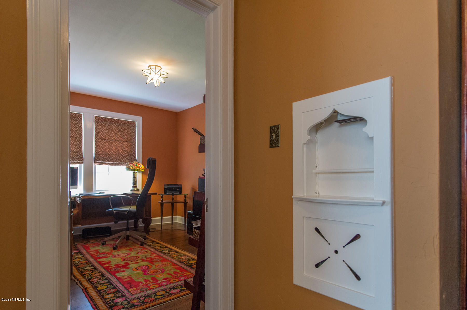 824 South Shores Road Jacksonville, FL 32207 - Photo 13 of 19 a view of a hallway with workspace and bedroom