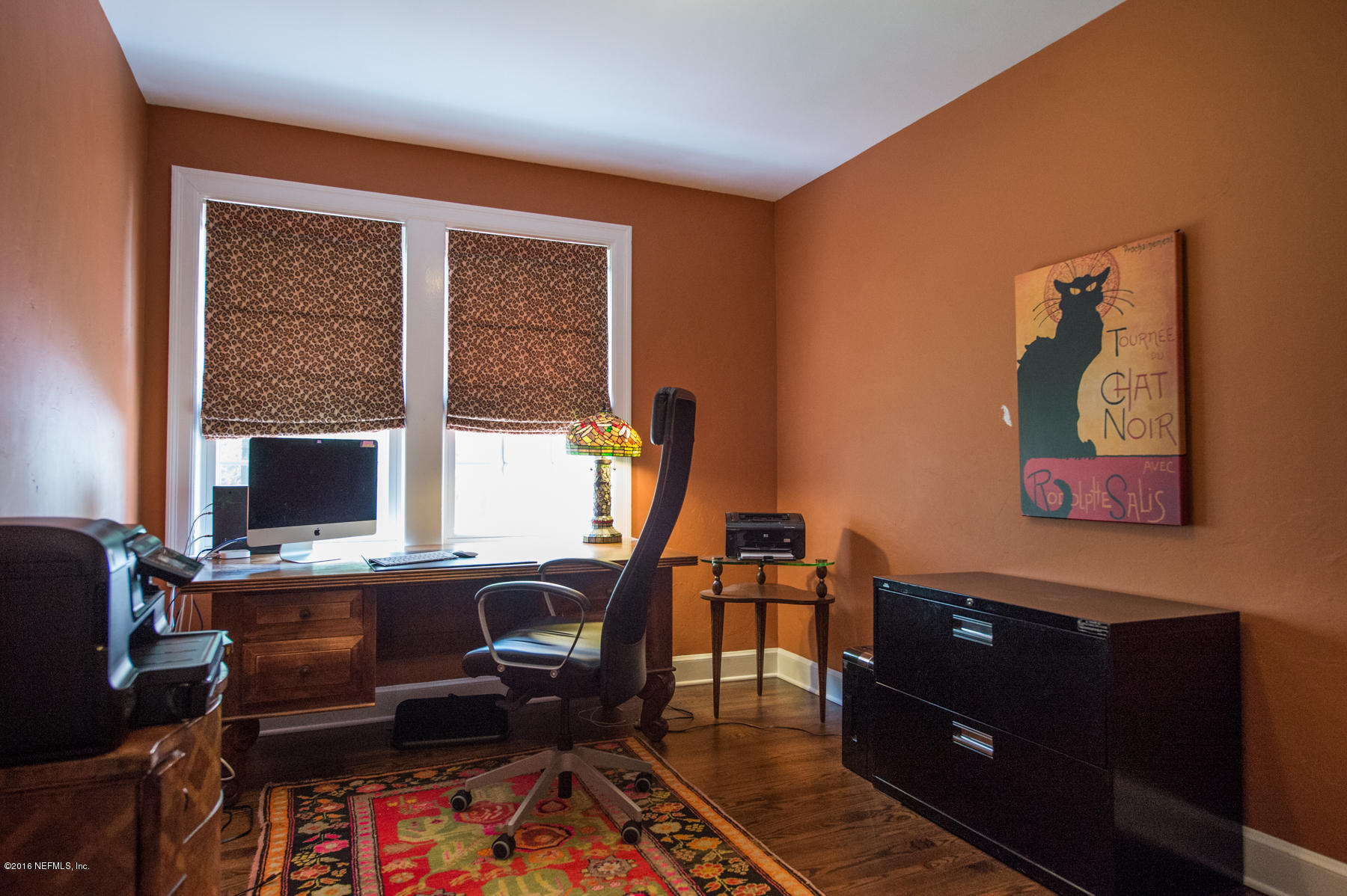 824 South Shores Road Jacksonville, FL 32207 - Photo 14 of 19 a view of a workspace with furniture and a window