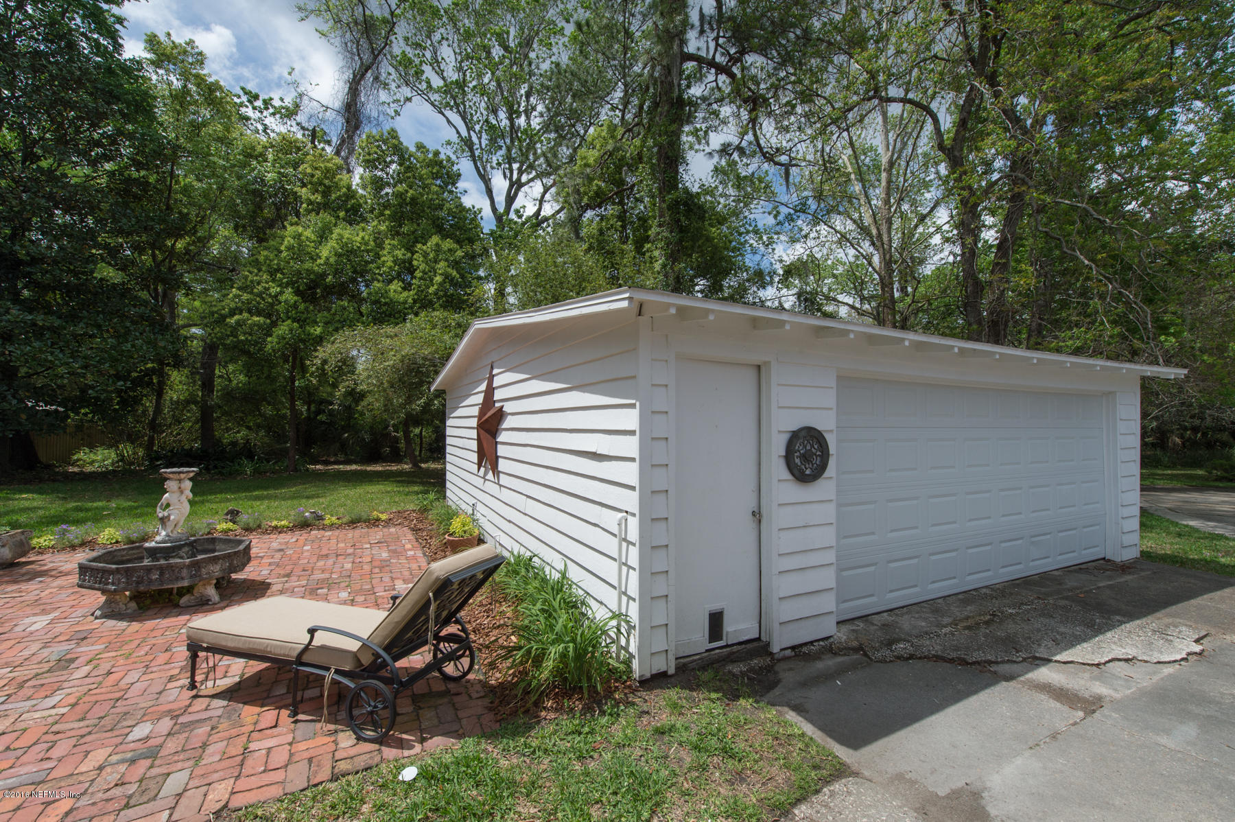 824 South Shores Road Jacksonville, FL 32207 - Photo 18 of 19 a view of a patio in backyard