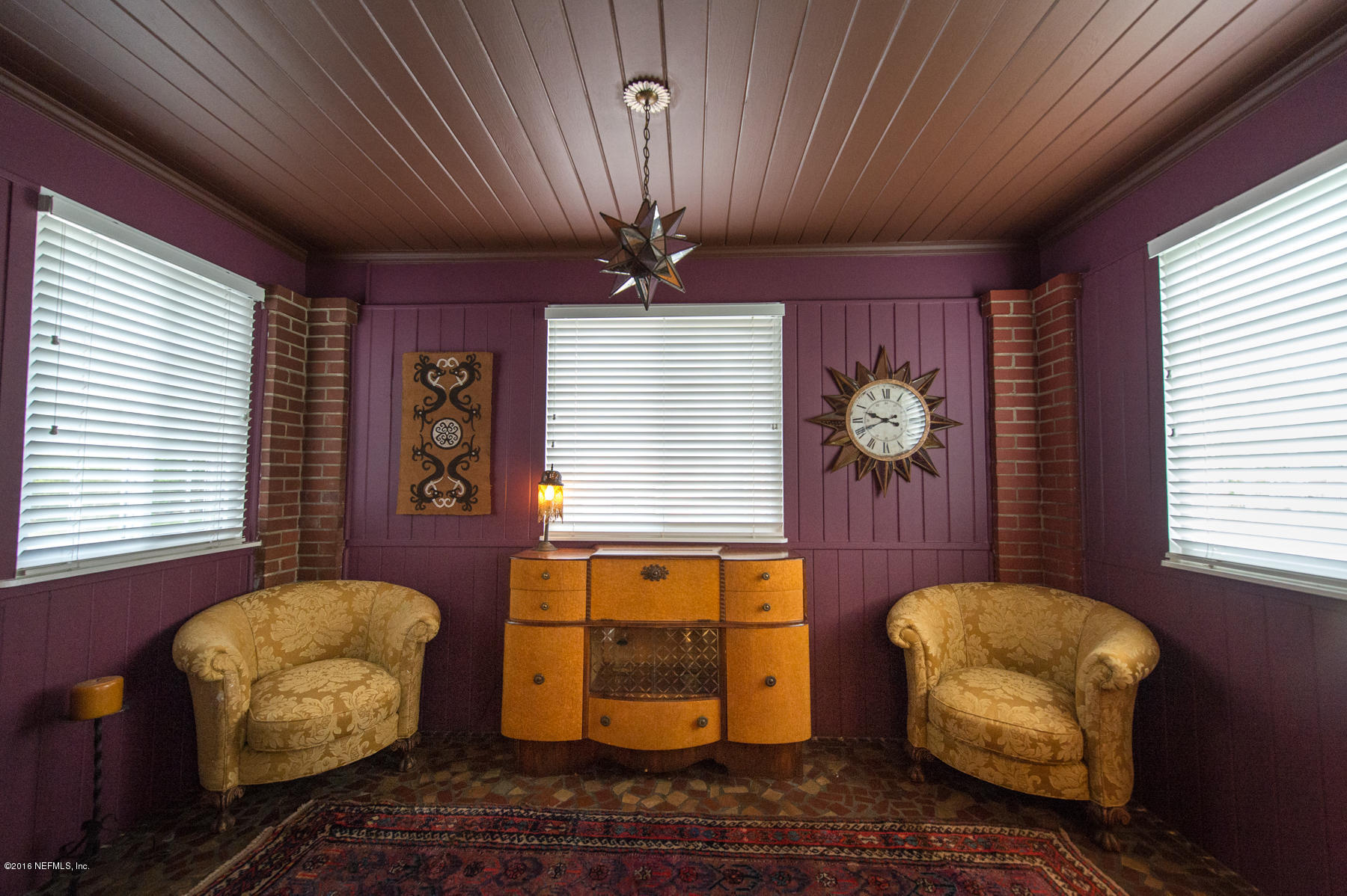 824 South Shores Road Jacksonville, FL 32207 - Photo 4 of 19 a bedroom with furniture and a window