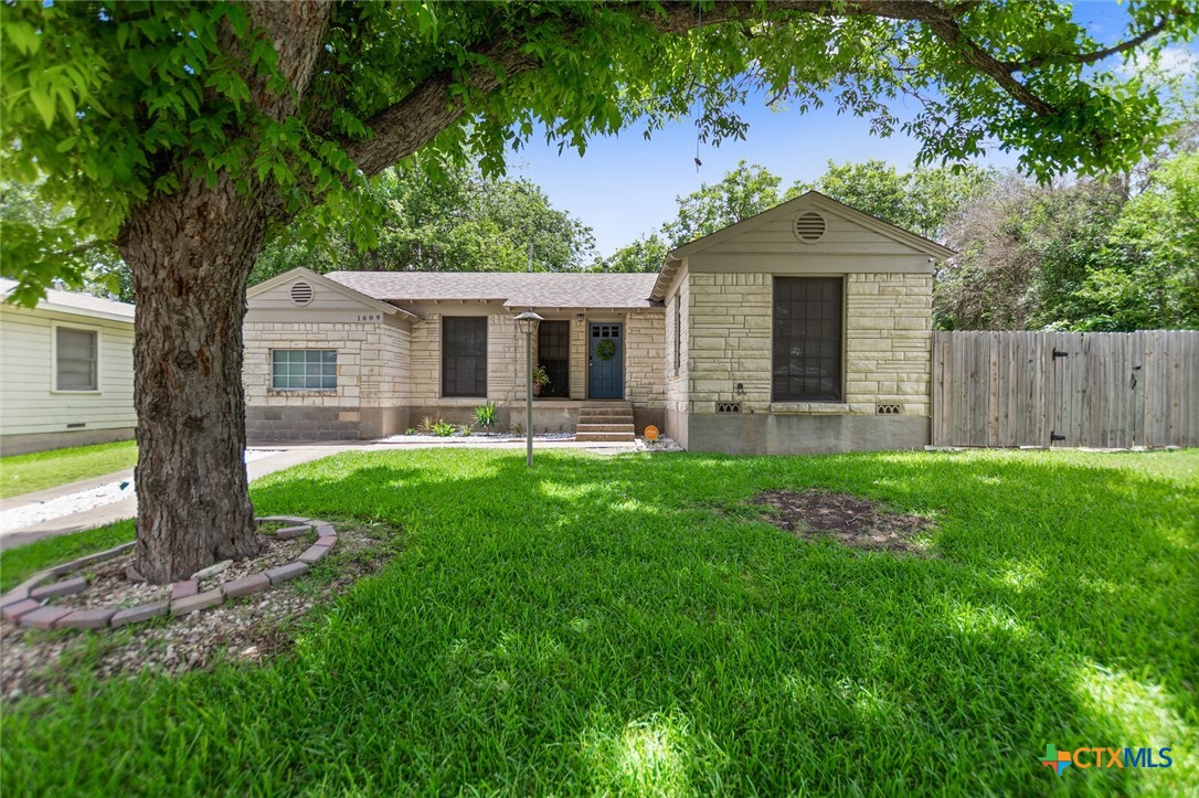 1609 South 39th Street Temple, TX 76504 - Photo 1 of 19 a front view of house with yard and green space