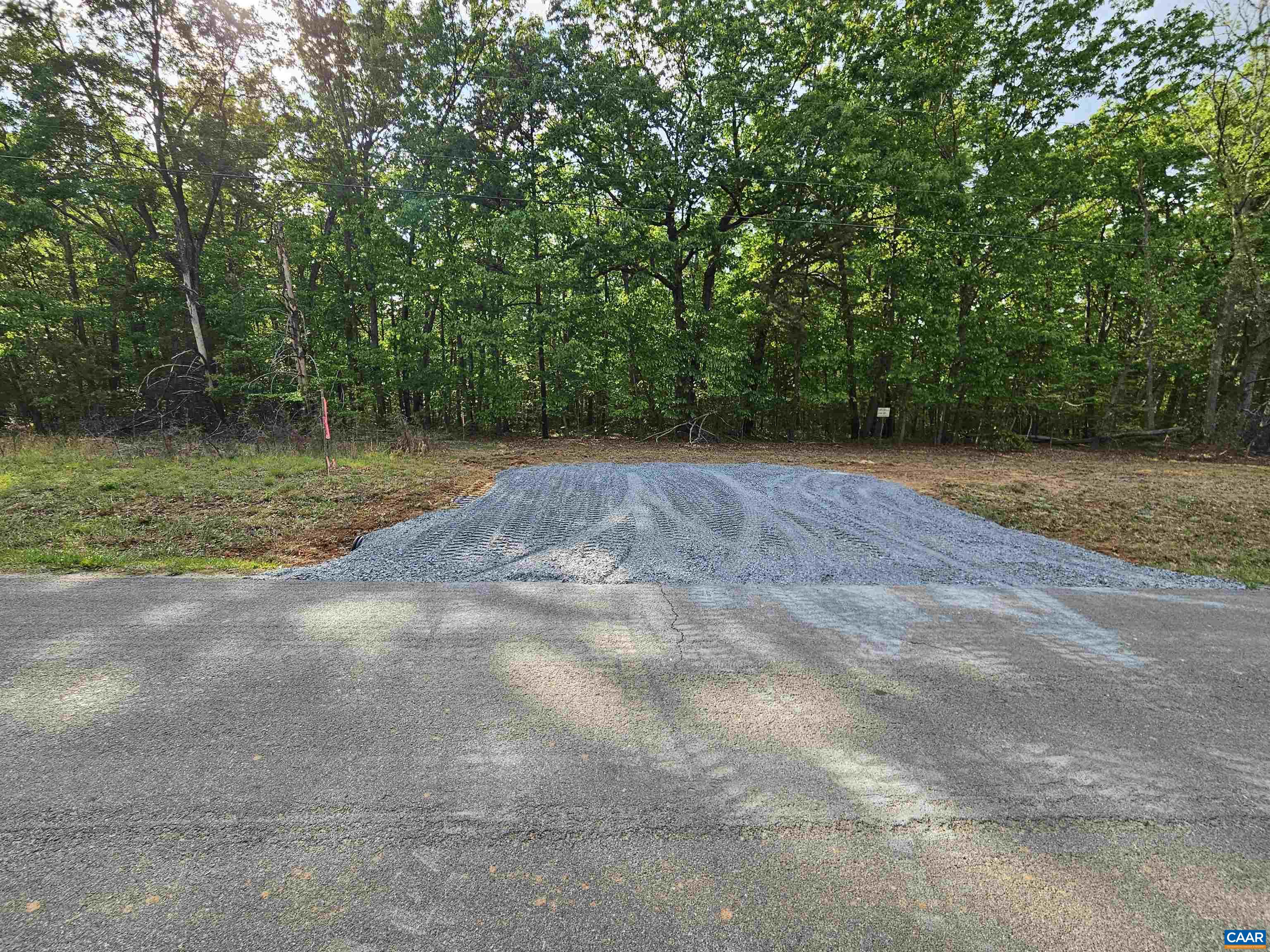 6.939 Axtell Road Howardsville, VA 24562 - Photo 2 of 8 a view of a yard with a tree