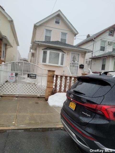 a view of car parked in front of house