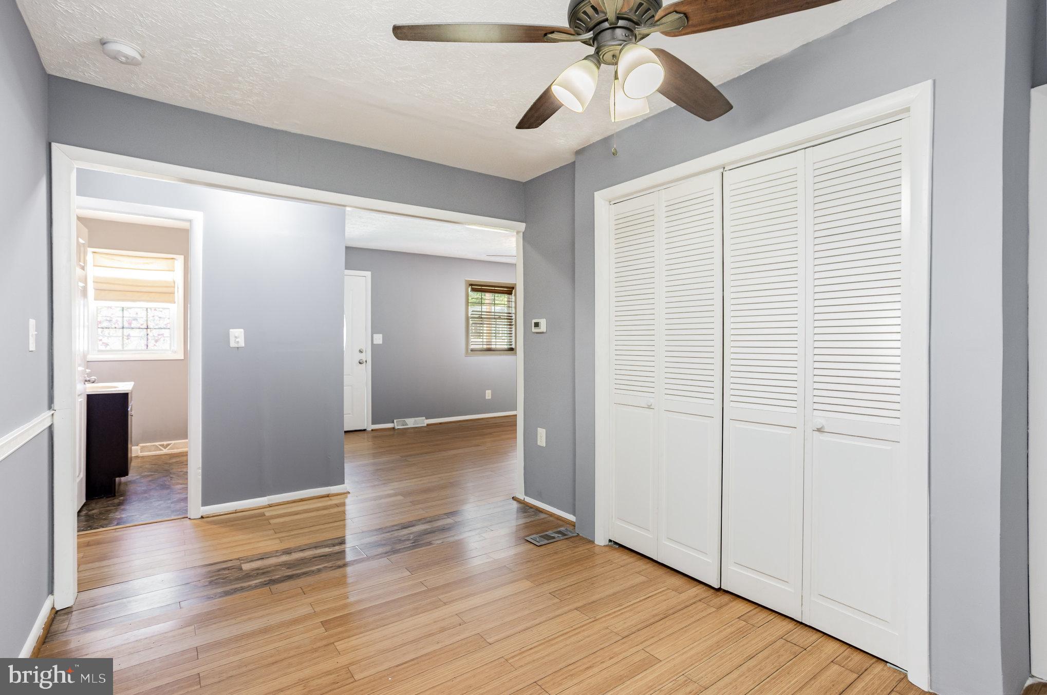 615 Pinehurst Street Aberdeen, MD 21001 - Photo 13 of 39 wooden floor in an empty room with a window