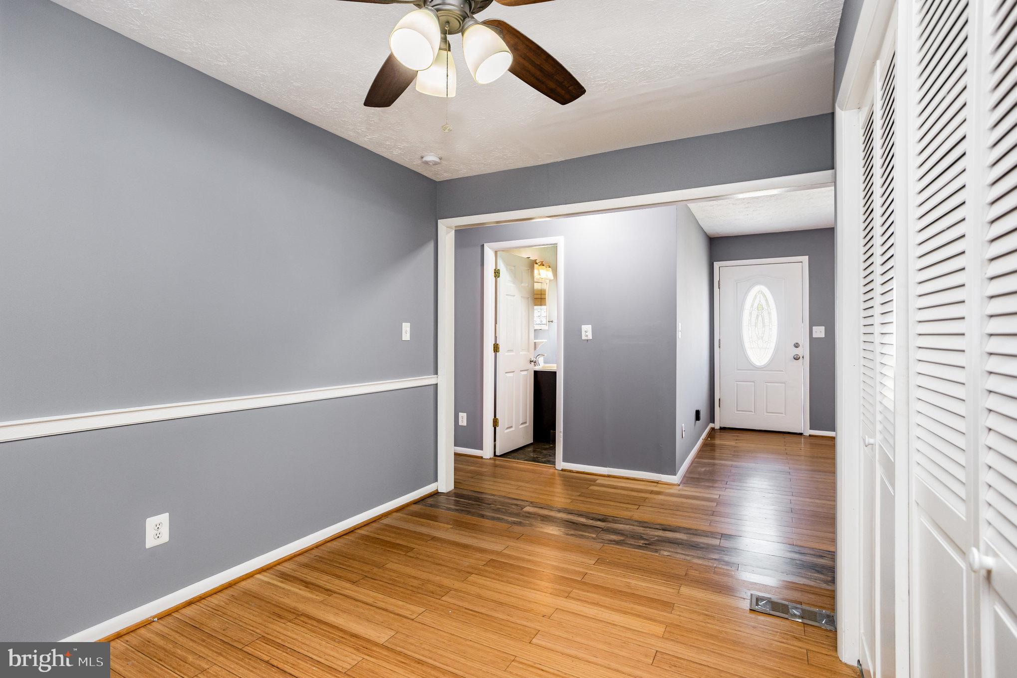 615 Pinehurst Street Aberdeen, MD 21001 - Photo 14 of 39 wooden floor in an empty room with a window