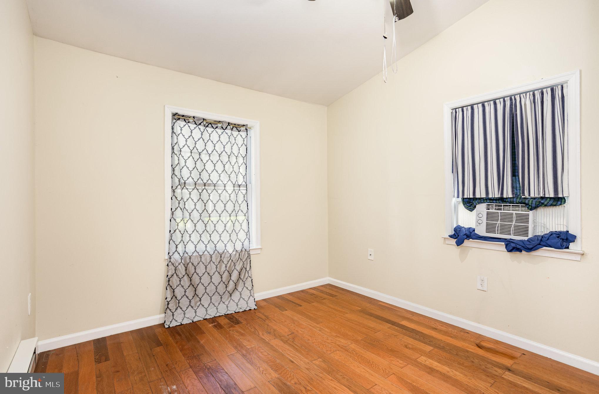 615 Pinehurst Street Aberdeen, MD 21001 - Photo 25 of 39 a view of an empty room with wooden floor