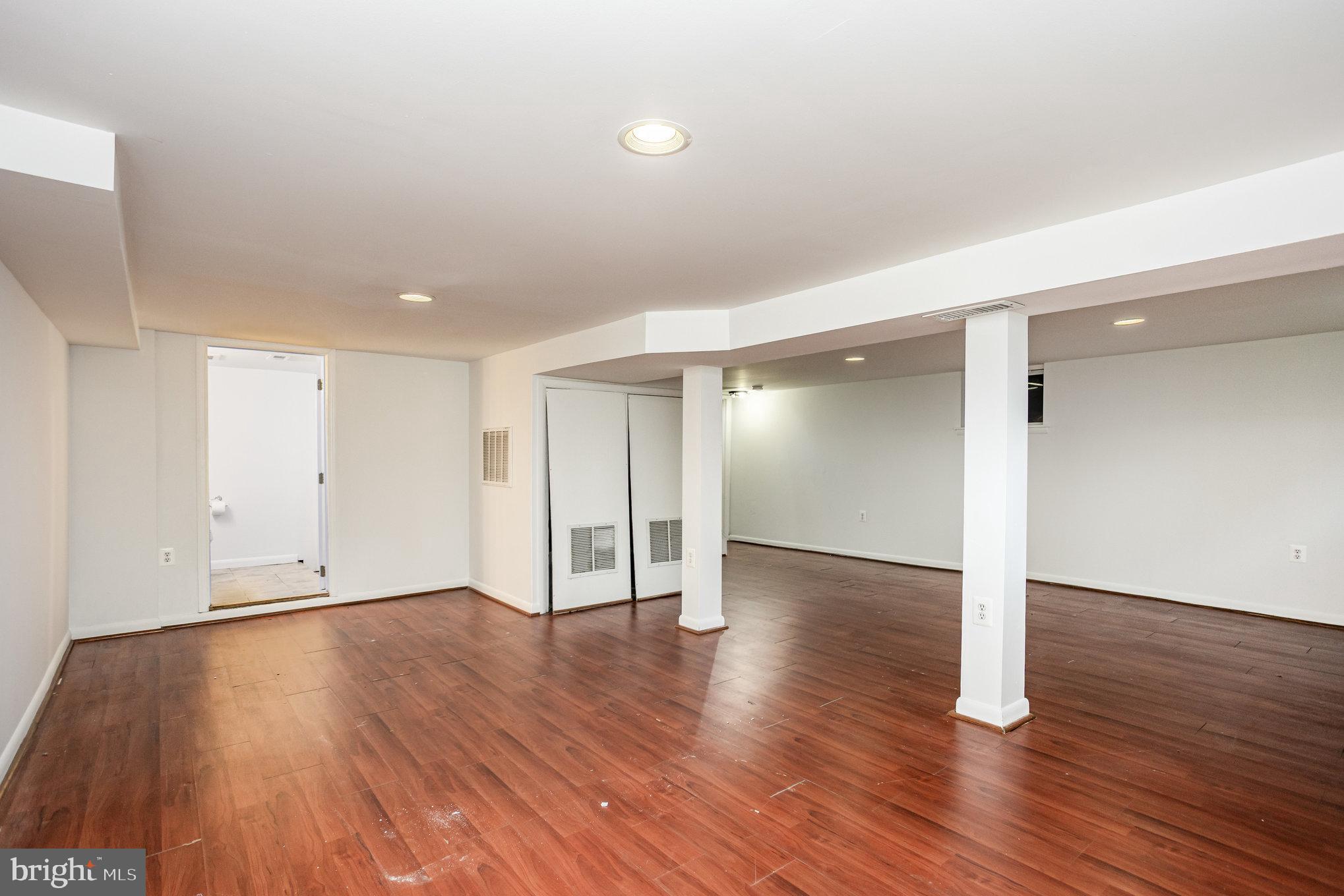 615 Pinehurst Street Aberdeen, MD 21001 - Photo 32 of 39 a view of an empty room with wooden floor