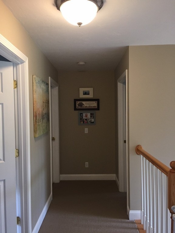 10 Baker Pond Road Charlton, MA 01507 - Photo 17 of 21 a view of hallway with stairs