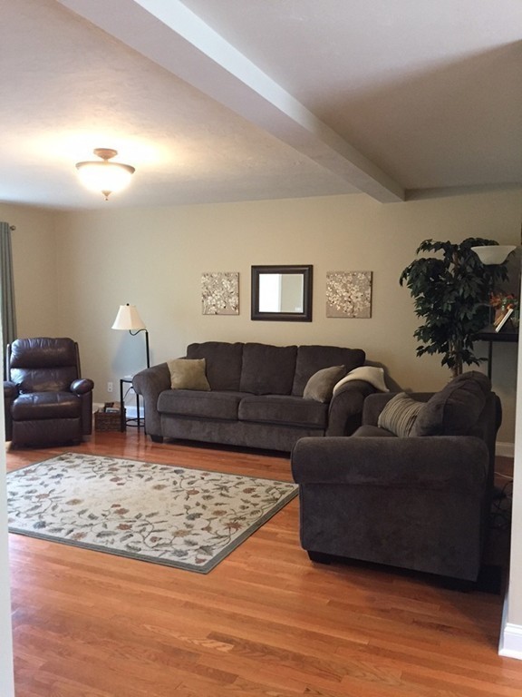 10 Baker Pond Road Charlton, MA 01507 - Photo 5 of 21 a living room with furniture and a couch