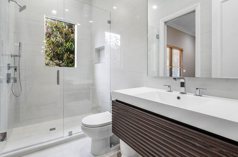 17895 Cadena Drive Boca Raton, FL 33496 - Photo 36 of 49 a bathroom with a sink a toilet and shower