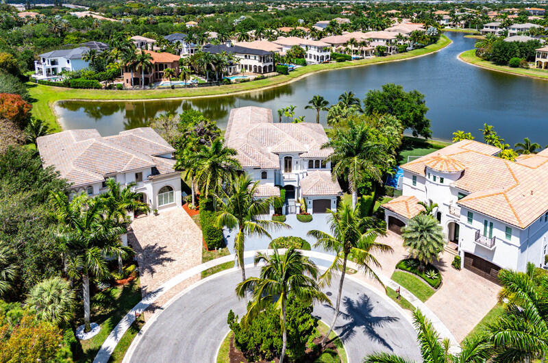 17895 Cadena Drive Boca Raton, FL 33496 - Photo 4 of 49 an aerial view of a house with a lake view