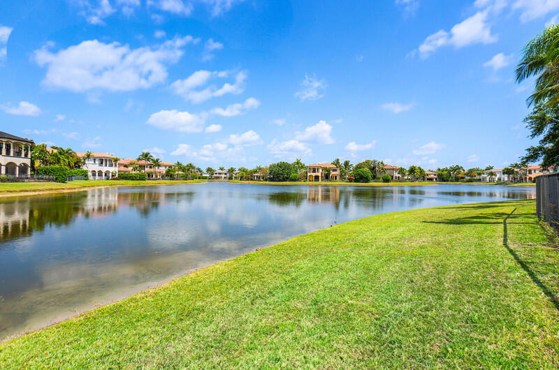 17895 Cadena Drive Boca Raton, FL 33496 - Photo 49 of 49 a view of a lake with houses in the back