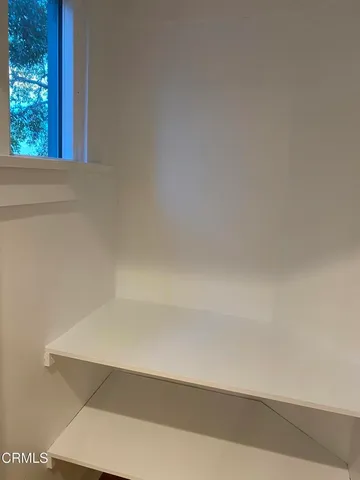 a view of a terrace with sitting area