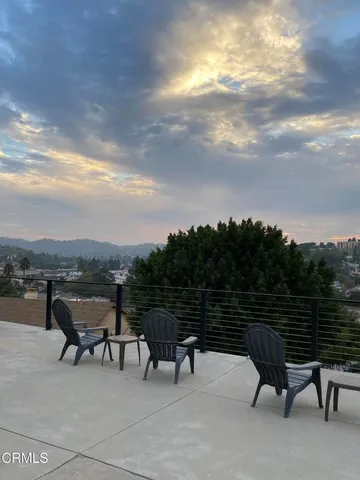 a view of a terrace with sitting area