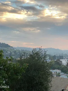 a view of a building from a ceiling window