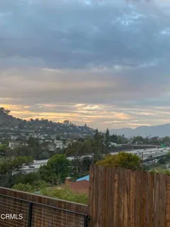 a view of a balcony with lake view and mountain view