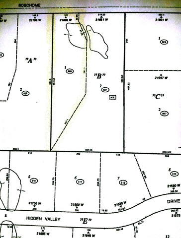 21665 West Boschome Road Kildeer, IL 60047 - Photo 3 of 3 a picture of a bathroom with a picture of a shower