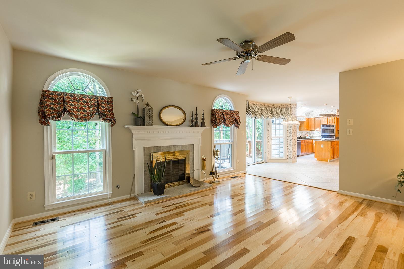 3622 Beaver Ford Road Woodbridge, VA 22192 - Photo 3 of 25 Family Room w/ Gas FP. Hardwood Flrs.