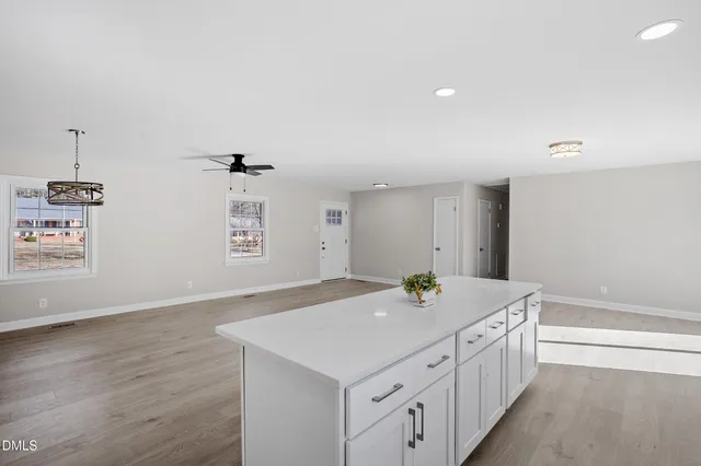 a bathroom with a sink double vanity and a bathtub